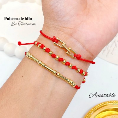 pulsera hilo rojo con dije en tendencia