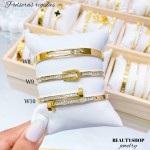pulsera rígida con pedrería en acero