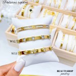pulsera rígida con pedrería en acero
