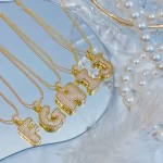 cadena con Dije letra brillante oro chino (solo dije 3$ 19.8&)
