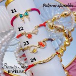 pulsera hilo color con dijes 12.5&