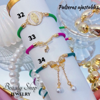 pulsera hilo color con dijes 12.5&