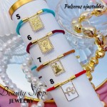 pulsera hilo color con dijes 12.5&