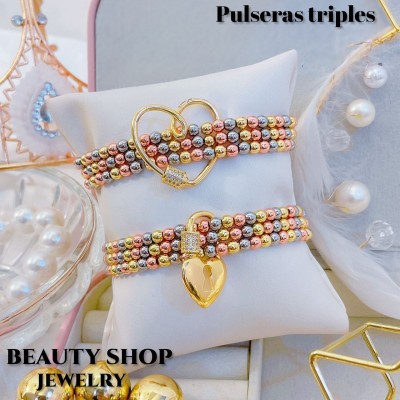 pulsera triple catier con dije 23.50&