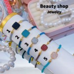 Pulsera ajustable color y dijes 10&