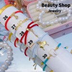 Pulsera ajustable color y dijes 10&