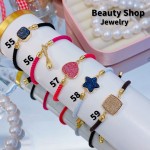 Pulsera ajustable color y dijes 10&