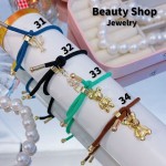 Pulsera ajustable color y dijes 10&