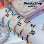 Pulsera ajustable color y dijes 10&