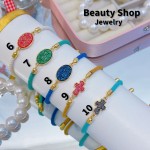 Pulsera ajustable color y dijes 10&