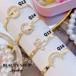 #Q Pulsera Rígidas con Dije Lujo  13.50&