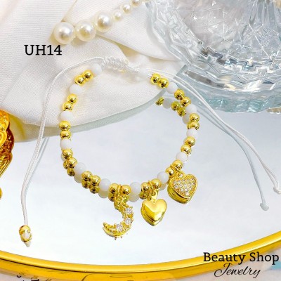 #uh pulsera balin colores con tres dije oro chino