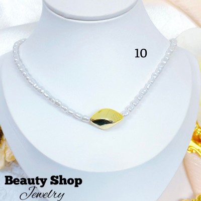 cadena perla con dije gold field 11&