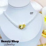 cadena perla con dije gold field 11&
