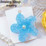 pinza hawaina con gota de agua