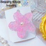 pinza hawaina con gota de agua