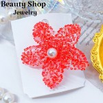 pinza hawaina con gota de agua