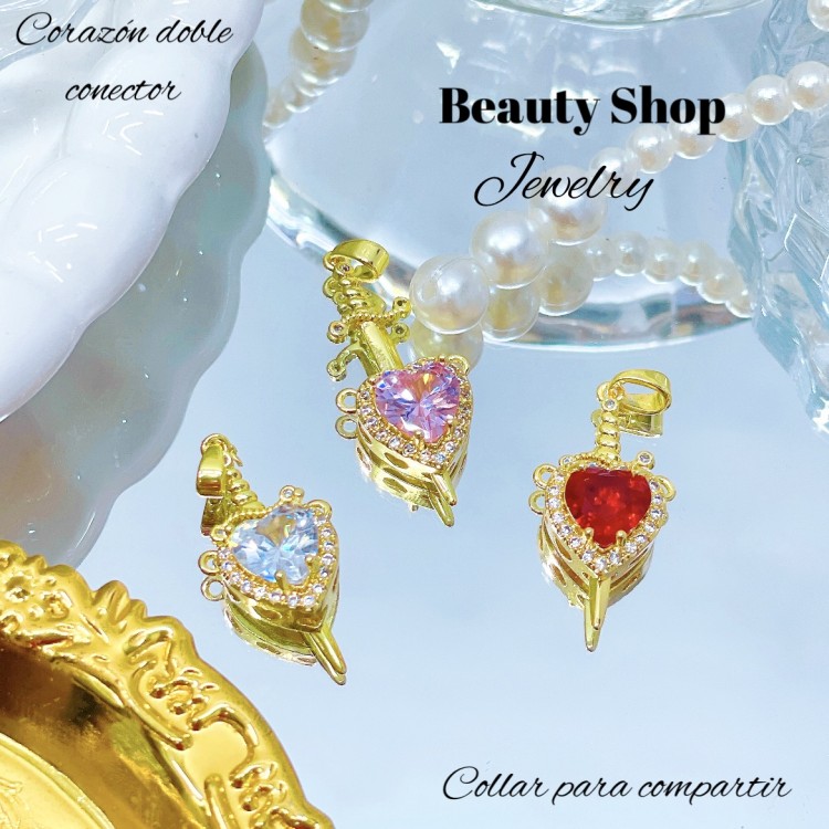 Dije de corazón doble conector con espada 