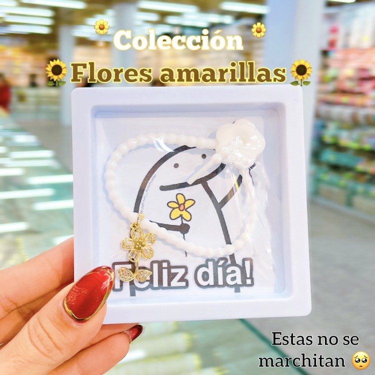 Pulsera engomada con dije de girasol 2.95$ 
