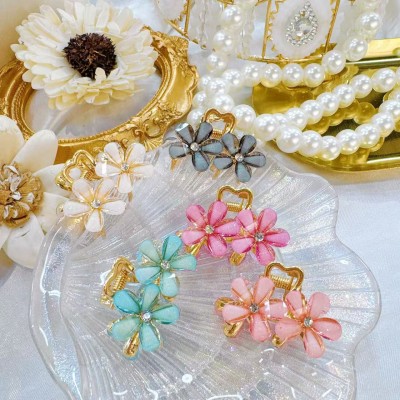 pinza de flor 2 por 1.65$