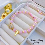 pulsera ajustable con dije corazon y cruz 14.50&