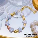 pulsera perla con figura oro chino