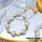 pulsera perla con figura oro chino