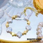 pulsera perla con figura oro chino