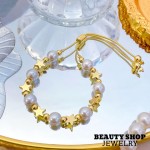 pulsera perla con figura oro chino