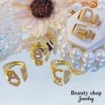 anillo letra con piedra oro chino 8.50&