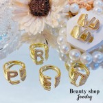 anillo letra con piedra oro chino 8.50&