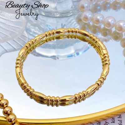 pulsera rigida oro chino 16&