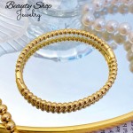pulsera rigida oro chino 16&