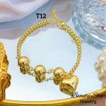 #T pulsera eslabon con dijes corazon 13.50&