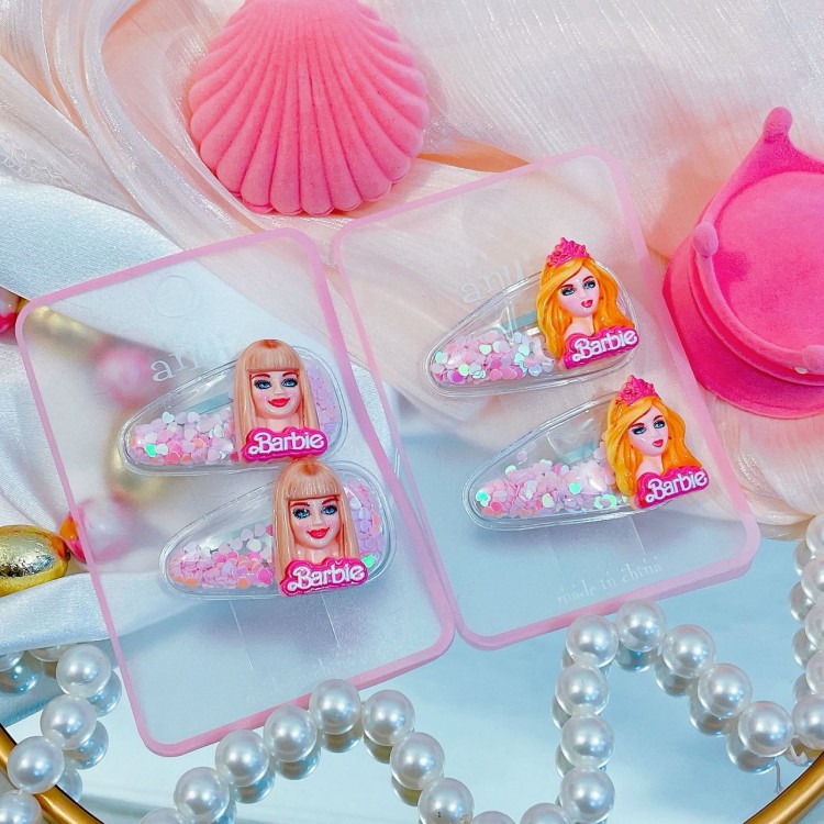 pinza de Barbie