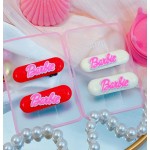 pinza de Barbie