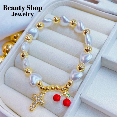 pulsera perla con balin cereza oro chino