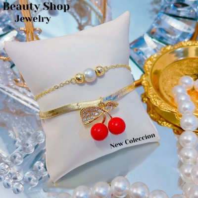 pulsera doble con dije cereza