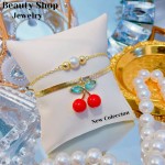 pulsera doble con dije cereza
