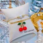 pulsera doble con dije cereza
