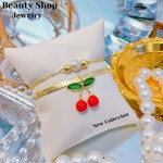 pulsera doble con dije cereza