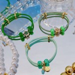pulsera ajustable con charms 15&