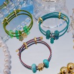 pulsera ajustable con charms 15&