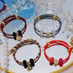 pulsera ajustable con charms 15&