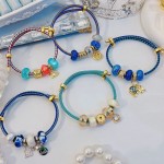pulsera ajustable con charms 22&