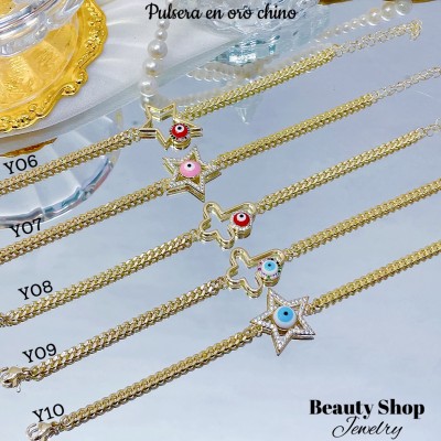 #Y Pulsera con tije  baño gold Field 18k