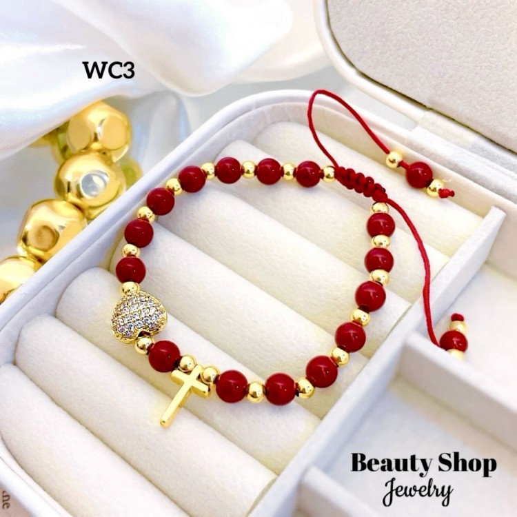 pulsera ajustable con dije corazon y cruz 14.50& pulsera ajustable con dije corazon y cruz 14.50&