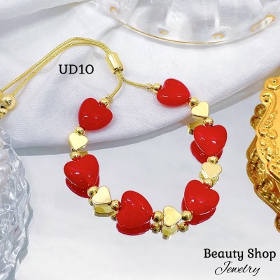 pulsera perla con figura oro chino