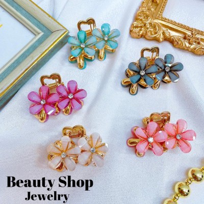 pinza de flor 2 por 1.65$