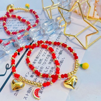 pulsera engomada con Dijes Oro Chino 14.5&